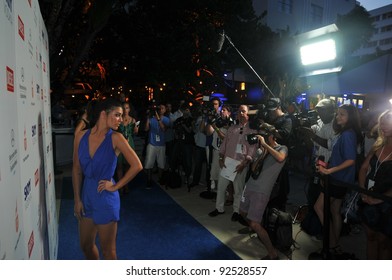 MIAMI - JULY 14: Models, Photographers And Guests At The Official Opening Pool Party At Railegh Hotel South Beach For Mercedes-Benz Swim Fashion Week On July 14, 2011 In Miami, FL