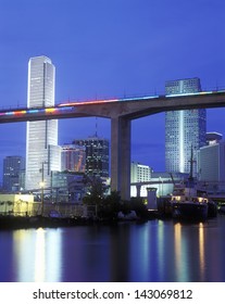 Miami Skyline By Night With Centrust Building And Metro Rail, Miami, Florida