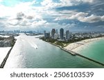 Miami South Beach. Drone aerial view of Miami Beach, Florida. Miami Beach in Florida with luxury apartments and waterway. Aerial view of Miami Beach with skyscrapers.