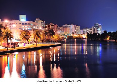 Miami South Beach Street View With Water Reflections At Night