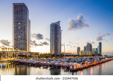 Miami South Beach Street View With Water Reflections At Night And The Marina