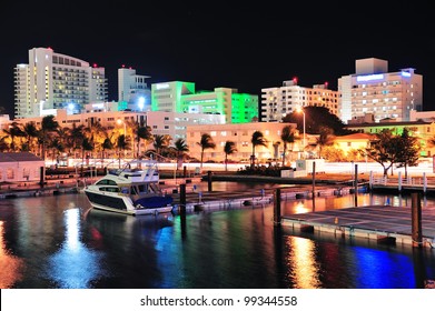 Miami South Beach Street View With Water Reflections At Night