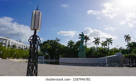 Miami, USA - April 23, 2022: The Holocaust Memorial In Miami Beach Features A Reflection Pool With A Hand Reaching Up And Bodies Climbing, A Memorial Wall, And Memorial Bridge.