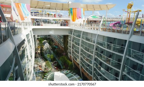 Miami, USA - April 29, 2022: People Having Fun At Pools, Bars, Entertainment And Innovative Activities At Symphony Of The Seas Is The Biggest Cruise Ship At Miami, USA On April 29, 2022