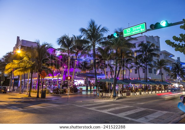 MIAMI, USA - AUG 19, 2014:\
Night view at Ocean drive  in Miami, USA. Art Deco Night-Life in\
South Beach at ocean drive is one of the main tourist attractions\
in Miami.