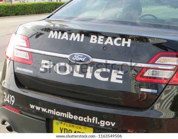 Miami  USA - June 2015: Police car parked in\
Mid-Beach, Miami,\
Florida.