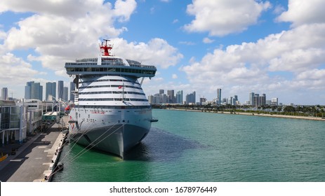 Miami, USA - March 20, 2020 - Close up view of Scarlet Lady. A new cruise ship operated by Virgin Voyages in the port of Miami during beautiful sunny day