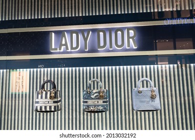 Miami, USA - March 20, 2021: Illuminated Lady Dior Shopwindow Displaying Bags At Design District In Florida. Christian Dior