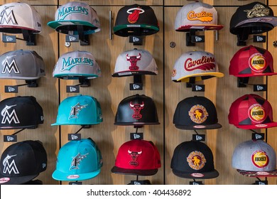 MIAMI, USA - MARCH 21, 2016: Different Baseball Caps Displayed Inside Sports Store.