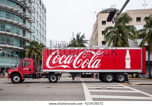 MIAMI, USA - MARCH 21, 2016:\
Coca Cola Truck (Coke) on the street. Coca-Cola is a carbonated\
soft drink, produced by The Coca-Cola Company of Atlanta,\
Georgia.