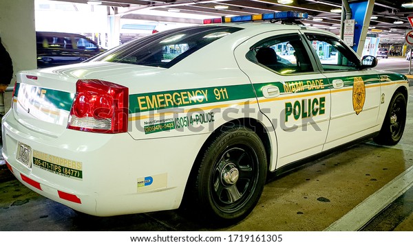 MIAMI, USA -\
NOVEMBER, 2019: Police car of Miami Dade Police Department (MDPD)\
in Miami, FL, USA. Back-Side\
shot