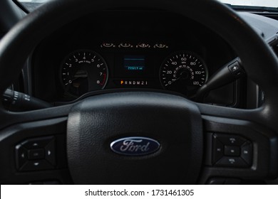 Miami, Year 2019: Big Size Pickup Interior, Ford F150 XLT. American Truck. Black. Steering Wheel, Dashboard, Information Display, Gear Lever.