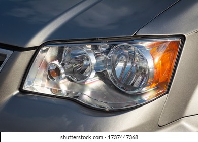 Miami, Year 2019: Closeup Of Headlight Of A Chrysler Town & Country. American Family Van.