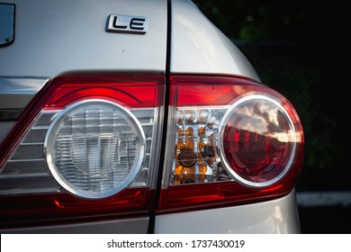 Miami, year 2019: Closeup to the tail light of a Toyota Corolla LE. Rear view of Japanese popular car.