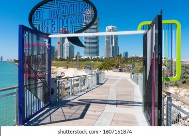 Miami,USA-march 15,2018:people Stroll In The South Point Park Pier In Miami During A Sunny Day.