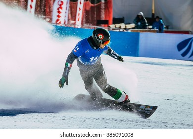 Miass, Russia - February 20, 2016: Male Snowboarder Finish Line After Race During Snowboard World Cup - Snowboard Cross