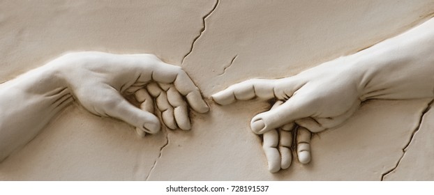 Michelangelo God's touch. Close up of human hands touching with fingers