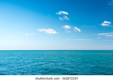 Michicgan Lake sea on a bright day with a blue sky - Powered by Shutterstock