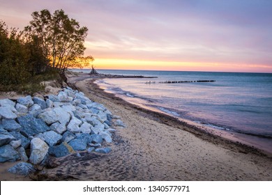 Michigan Beach Sunset. Sunset On The Wild Coast Of Lake Superior With Beach Hut On The Horizon In The Upper Peninsula Of Michigan At Whitefish Point In The USA.