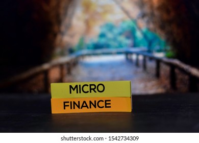 Micro Finance On The Sticky Notes With Bokeh Background