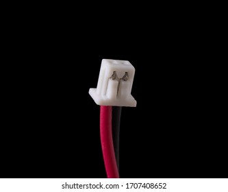 Micro jst 1.25 2 pin male plug isolated on black. Standard connector for small RC vehicles, batteries and motors