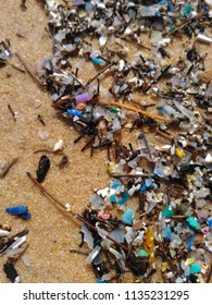 Micro Plastics On Sand Beach