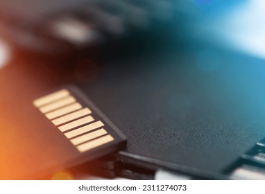 Micro sd card lies on a pile of memory cards. close-up. - Shutterstock ID 2311274073