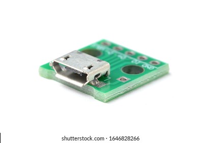 Micro USB female connector module, isolated on white background.