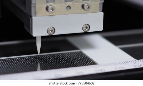 Microarray printing on glass slide, non-contact printing system, selective focus on tip and spots on glass slide