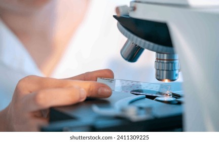 Microbial process investigation: Microscopes allow observing microbial processes such as bacterial growth and cell division. - Powered by Shutterstock