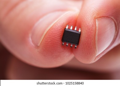 Microchip Between Finger.