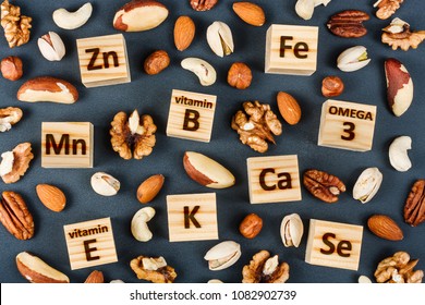 Microelements And Vitamins In Different Types Of Nuts. Healthy Food Concept