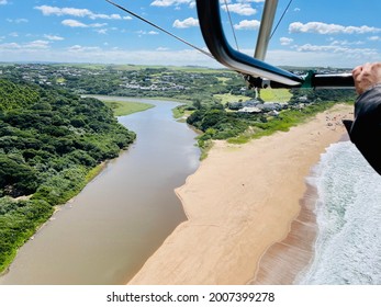 Microlight oceans and river mouth view