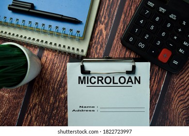 Microloan Write On A Paperwork Isolated On Office Desk.