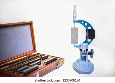Micrometer Calibration with gauge block in laboratory.