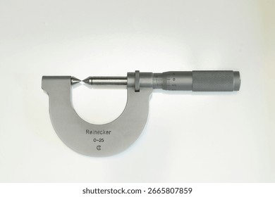 Micrometer, tool for measuring threads on bolts, isolated                