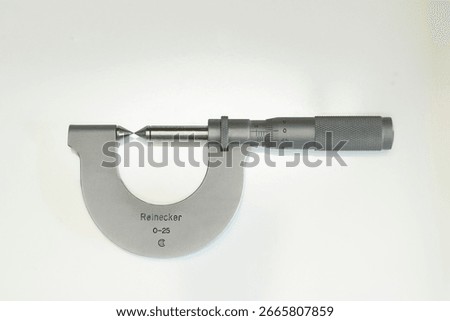 Micrometer, tool for measuring threads on bolts, isolated                