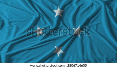 Micronesia flag with fabric texture background. National flag of Micronesia with cloth texture