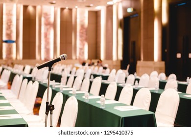 Microphone in an auditorium for shareholders' meeting or seminar event.