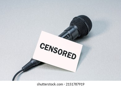 Microphone With Blank SENSORED On A Desk. World Press Freedom Day, Free Speech Concept.