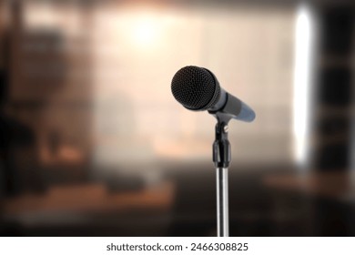 Microphone with blur light background for reporter report new or public speaking or journalist interview or speech performance broadcasting media live talk background concepts.