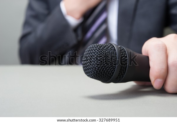 Microphone And Businessman