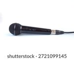 Microphone with a cable connected on white background