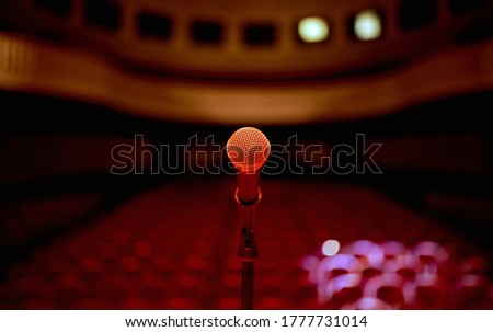 microphone in the center in front of an empty concert hall before the standup performance 