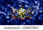 Microphone on a background of a blurry State of Pennsylvania flag close-up