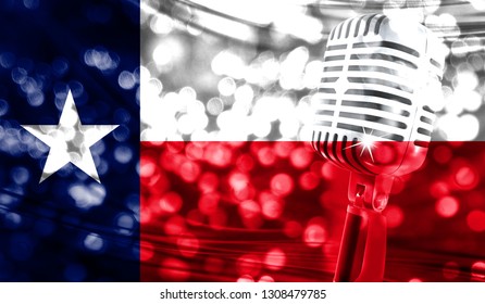 Microphone On A Background Of A Blurry State Of Texas Flag Close-up