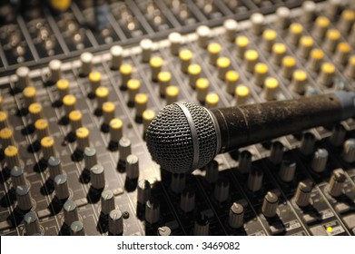 Microphone On Soundboard Under Theater Lighting