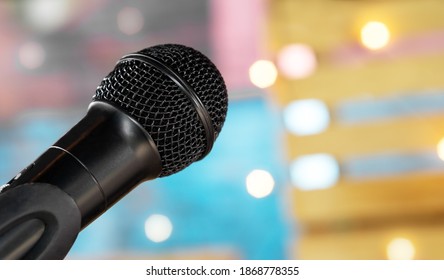 The Microphone On Stage Backstage Ready For A Singer, Comedian, Or Karaoke Performance During The Day