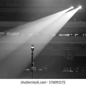 Microphone On The Stage And Empty Hall During The Rehearsal Black And White Photo