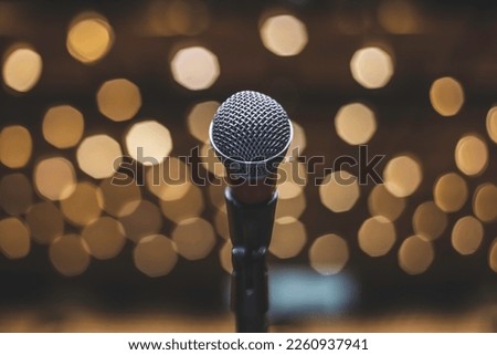 Microphone On The Theater Stage Before The Concert With Blurred Lights